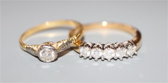 An 18ct and five stone diamond half hoop ring and an 18ct and solitaire diamond ring.